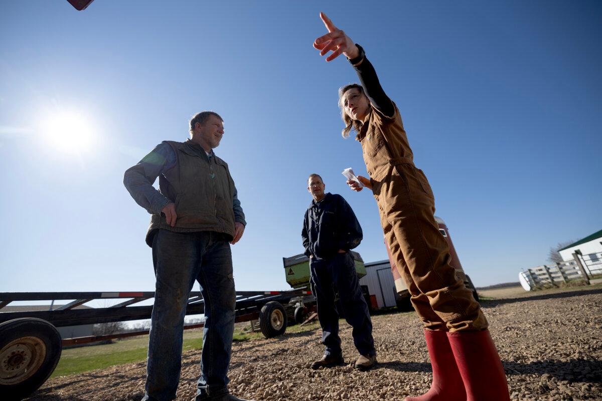Chef Karyn Tomlinson (right) chats with David Nyquist (left) at the David and Mariana Nyquist Grass-Fed Dairy in Cokato, Minnesota, on Saturday, April 19, 2025. (Carlos Gonzalez/The Minnesota Star Tribune/TNS)