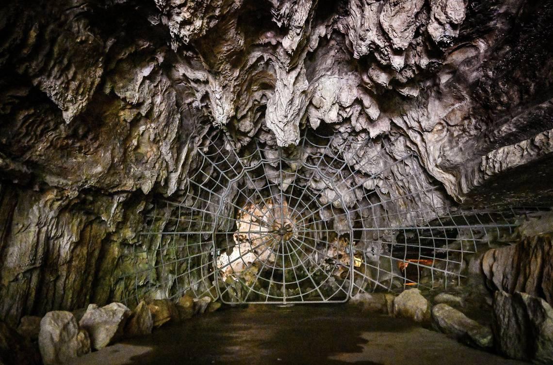 The famed spider web gate at the entrance to Crystal Cave will once again open for visitors following years of closure. (Craig Kohlruss/Fresno Bee/TNS)