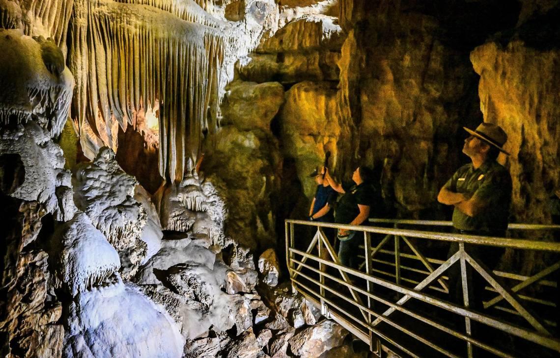 Visitors get an early look at calcium carbonate formations in Crystal Cave's Organ Room within Sequoia National Park as the cave officially reopens to the public following years of closures due to COVID-19, fires, and floods. (Craig Kohlruss/Fresno Bee/TNS)