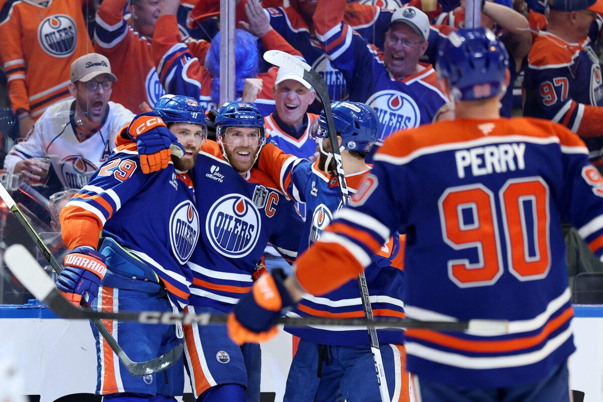 Leon Draisaitl #29 celebrates with Connor McDavid #97 of the Edmonton Oilers during the first period against the Florida Panthers in Game Two of the 2025 Stanley Cup Final at Rogers Place in Edmonton, Alberta, Canada, on June 6, 2025. (Steph Chambers/Getty Images)