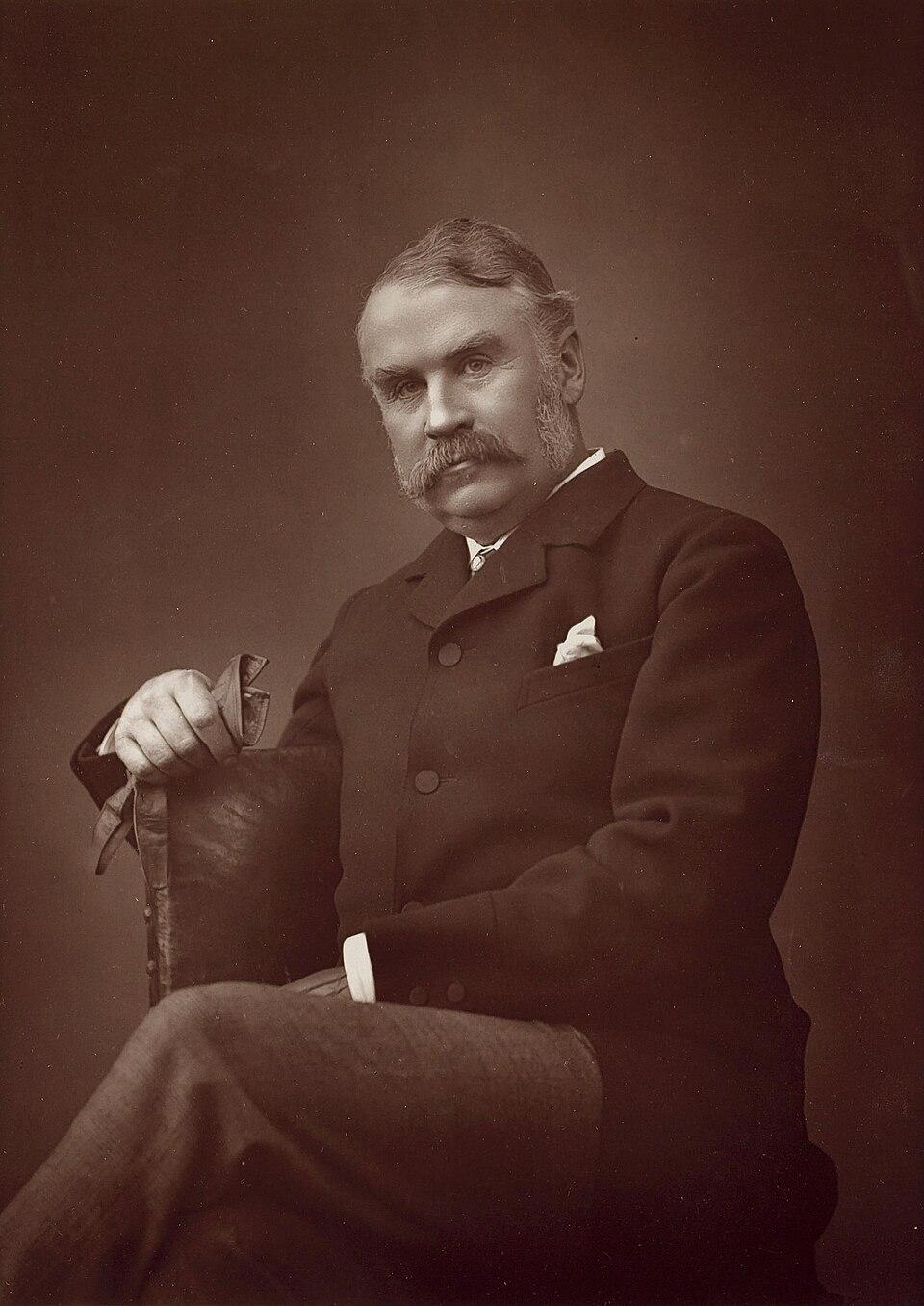 A photograph of Sir William Schwenck Gilbert, taken in the late 1880s by Herbert Rose Barraud. (Public Domain)