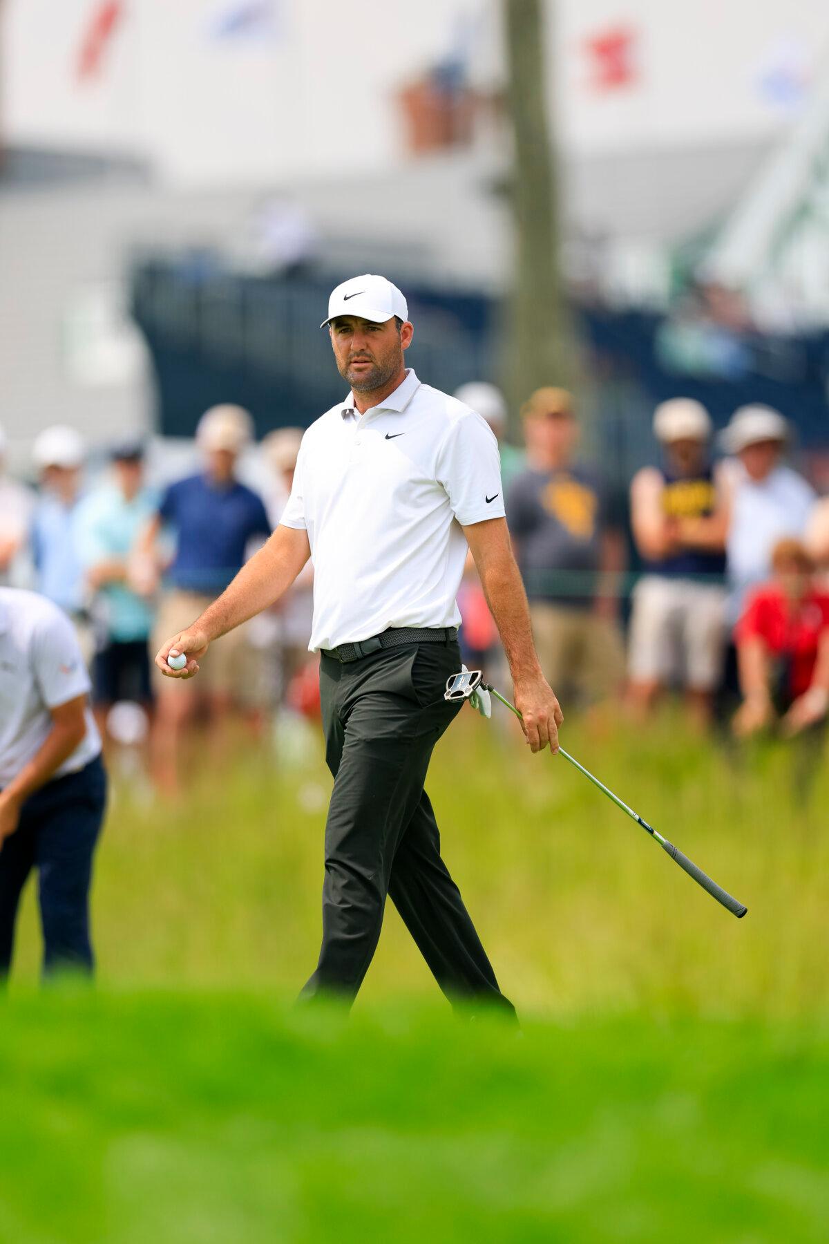 Oakmont Hosts Record 10th US Open: Beware! The Beast Beckons | USNN World News Scottie Scheffler strolls across the 11th green during a practice round ahead of the 2025 U.S. Open at Oakmont Country Club in Oakmont, Pa. on Monday, June 9, 2025. (Mike Ehrmann/USGA)
