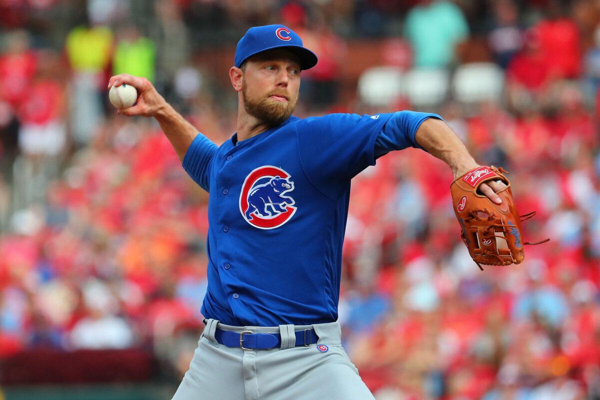 Ben Zobrist of the Chicago Cubs delivers a pitch against the St. Louis Cardinals in the ninth inning at Busch Stadium in St Louis, Mo., on Sept. 29, 2019. (Dilip Vishwanat/Getty Images)