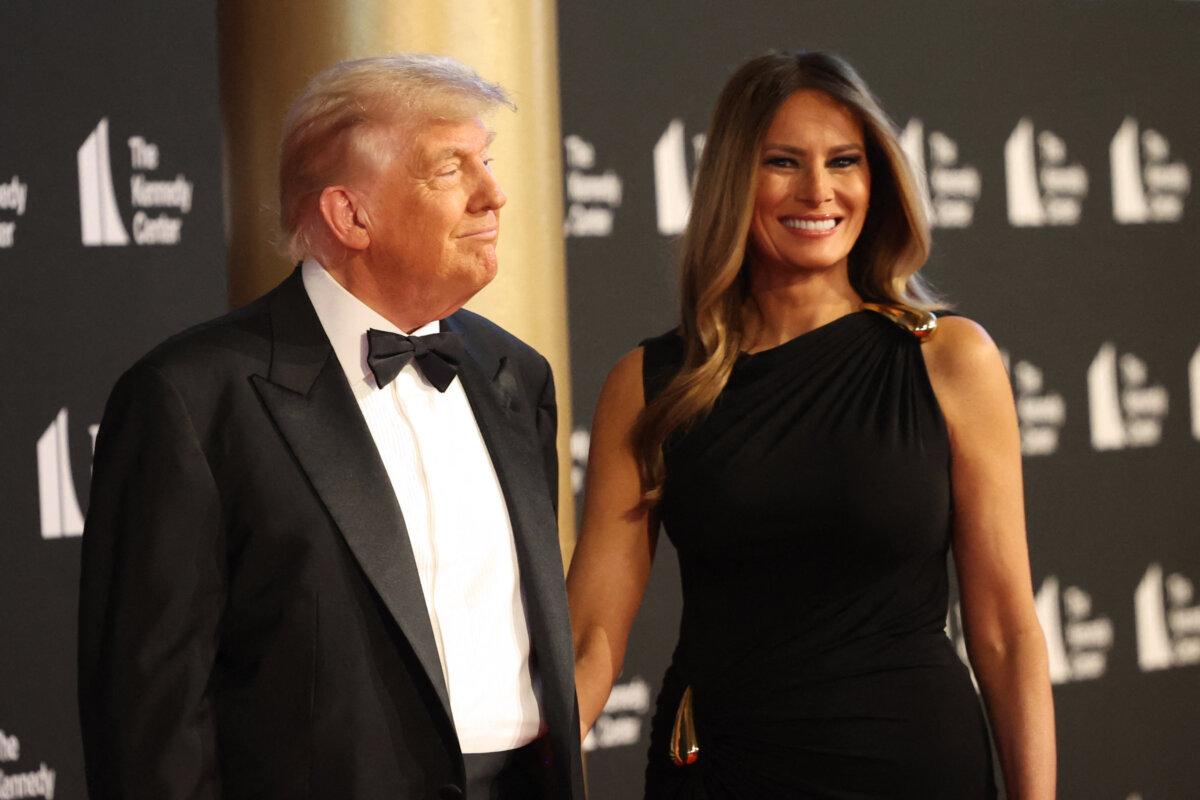 President Donald Trump (L) and First Lady Melania Trump arrive to attend the opening night of "Les Miserables" at the Kennedy Center in Washington on June 11, 2025. (Alex Wroblewski/AFP via Getty Images)