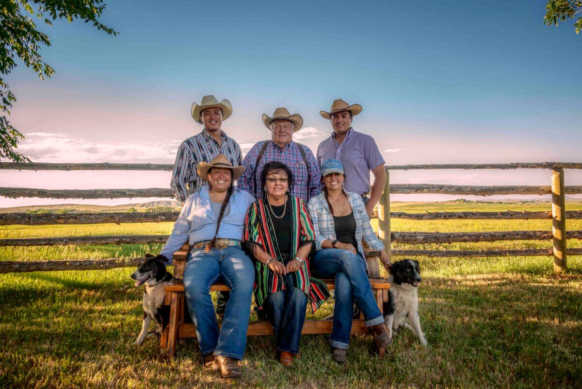 (L–R, standing) Jess, Dwayne, and Jared Oldham, with (L–R, seated) Odessa and Denise Oldham and Odessa’s partner, Meagan Jones. (Maria Coulson)
