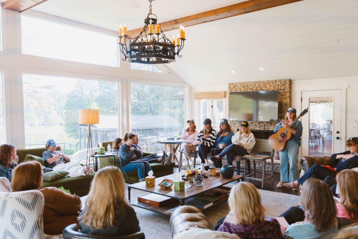 Widows share stories with each other during one of Never Alone Widows’s annual retreats in Georgia, April 2024. (Come Alive Visuals)