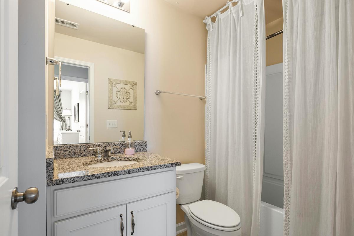 Bathrooms should be spotless, odor-free, and clear of personal items such as toothbrushes or razors. (Curtis Adams/Pexels)