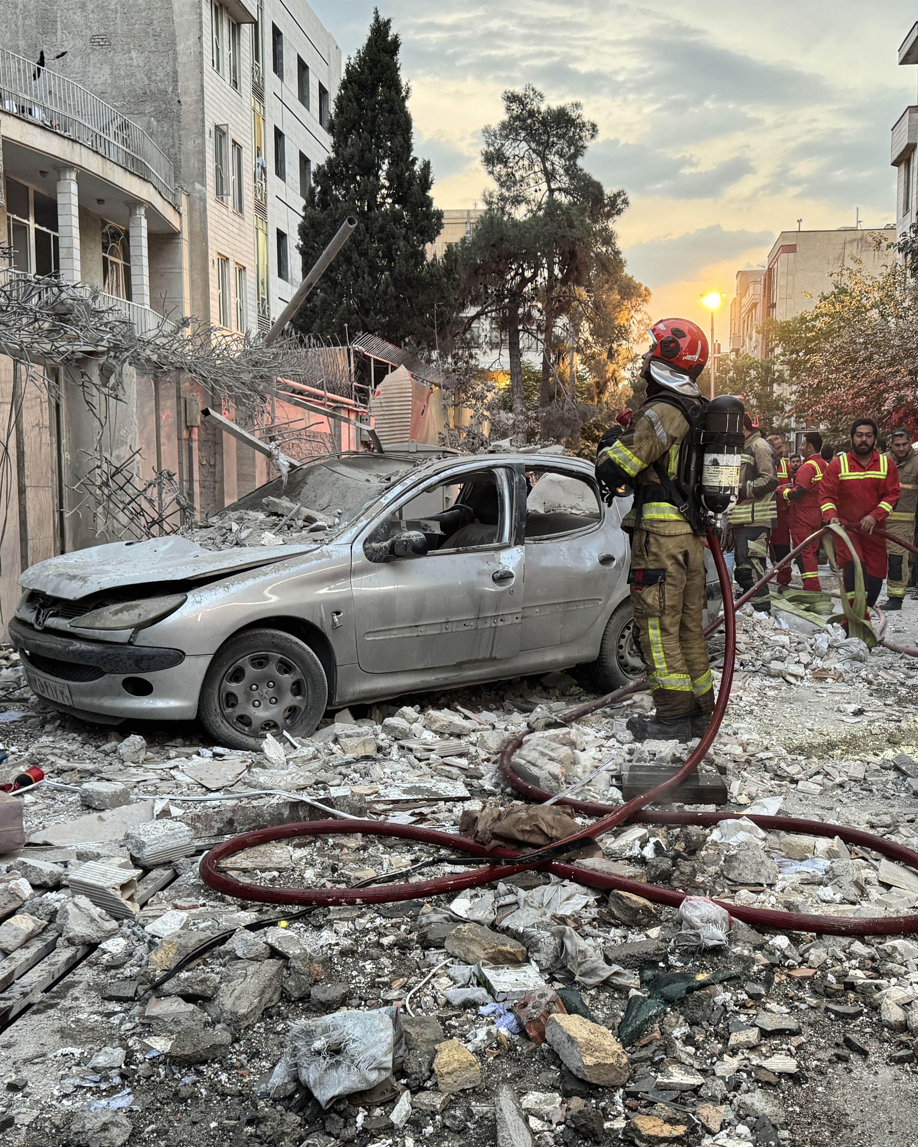 Day in Photos: Israel Attacks Iran, Military Parade Preparations in Washington, India Mourns Plane Crash