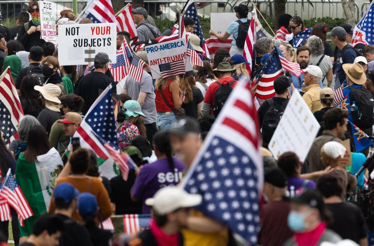 People protest in Los Angeles on June 14, 2025. (John Fredricks/The Epoch Times)