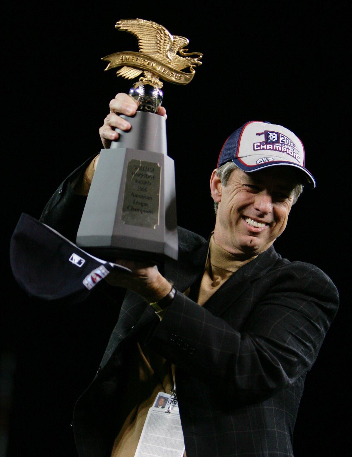 MLB Executive Dombrowski Building Hall of Fame Career With Surging Phillies | USNN World News General Manager David Dombrowski of the Detroit Tigers celebrates on the field after defeating the Oakland Athletics in Game Four of the American League Championship Series at Comerica Park in Detroit, Mich., on Oct. 14, 2006. (Jed Jacobsohn/Getty Images)