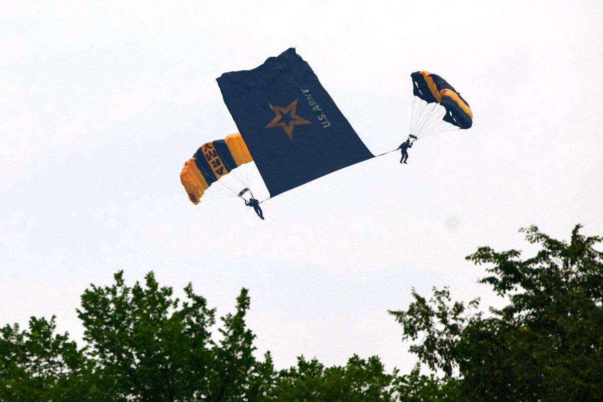 The Army's Golden Knights parachute onto the Ellipse during the Army 250th Anniversary Parade in Washington on June 14, 2025. (Photo by Amid Farahi/AFP via Getty Images)
