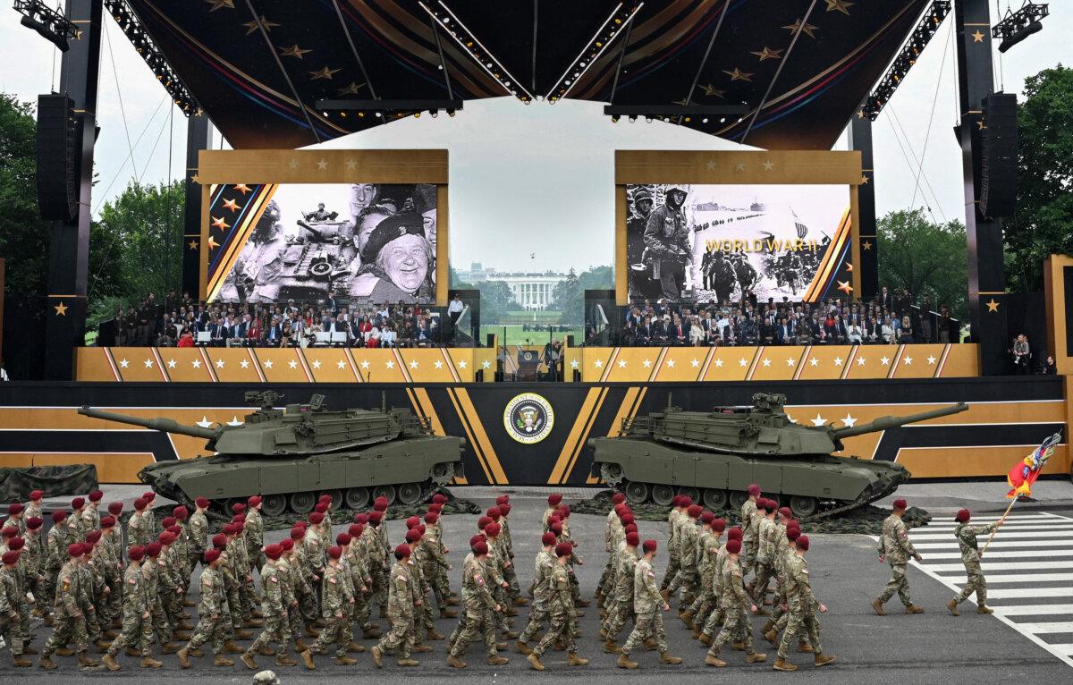 President Donald Trump (C-R) watches as members of the 82nd Airborne Division march past during the Army 250th Anniversary Parade from the Ellipse in Washington on June 14, 2025. (Mandel Ngan/AFP via Getty Images)