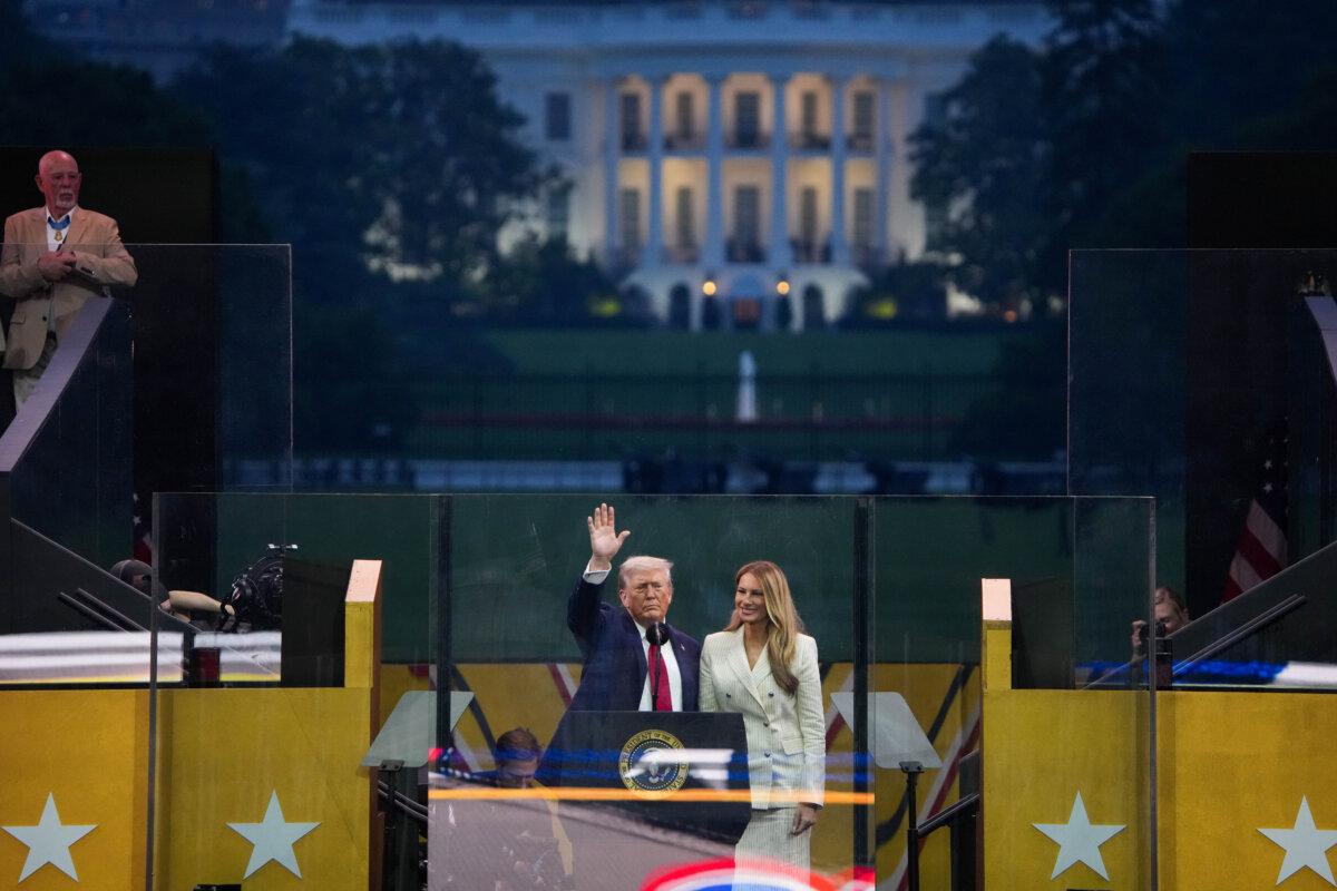 President Donald Trump and First Lady Melania Trump stand together at the ending of the U.S Army parade in Washington on June 14, 2025. (Andrew Harnik/Getty Images)