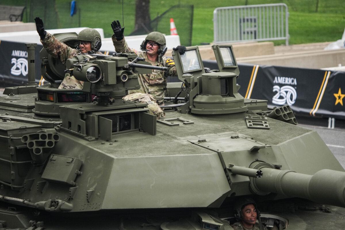 Members of the U.S. Army drive a M1A2 Abrams Main Battle tank in the Army 250th Anniversary Parade in Washington on June 14, 2025. (Andrew Harnik/Getty Images)