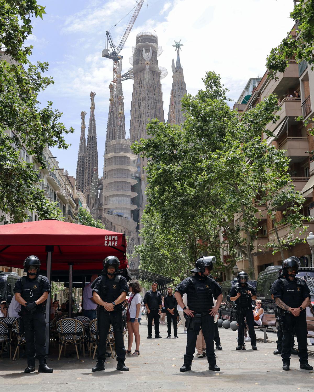 Day in Photos: Protests in Spain, First Veterans Day in Germany, Iran-Israel Strikes Continue