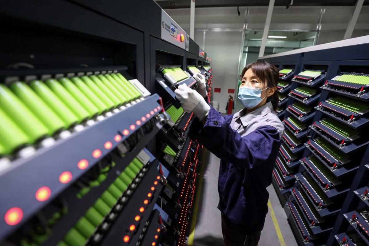 An employee works on a lithium battery production line at a factory in Huaibei, Anhui Province, China, on April 26, 2025. (STR/AFP via Getty Images)