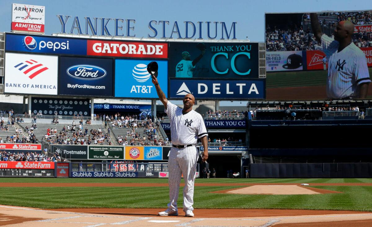 CC Sabathia #52 of the New York Yankees salutes the crowd as he is honored before a game against the Toronto Blue Jays at Yankee Stadium on Sept. 22, 2019. (Jim McIsaac/Getty Images)