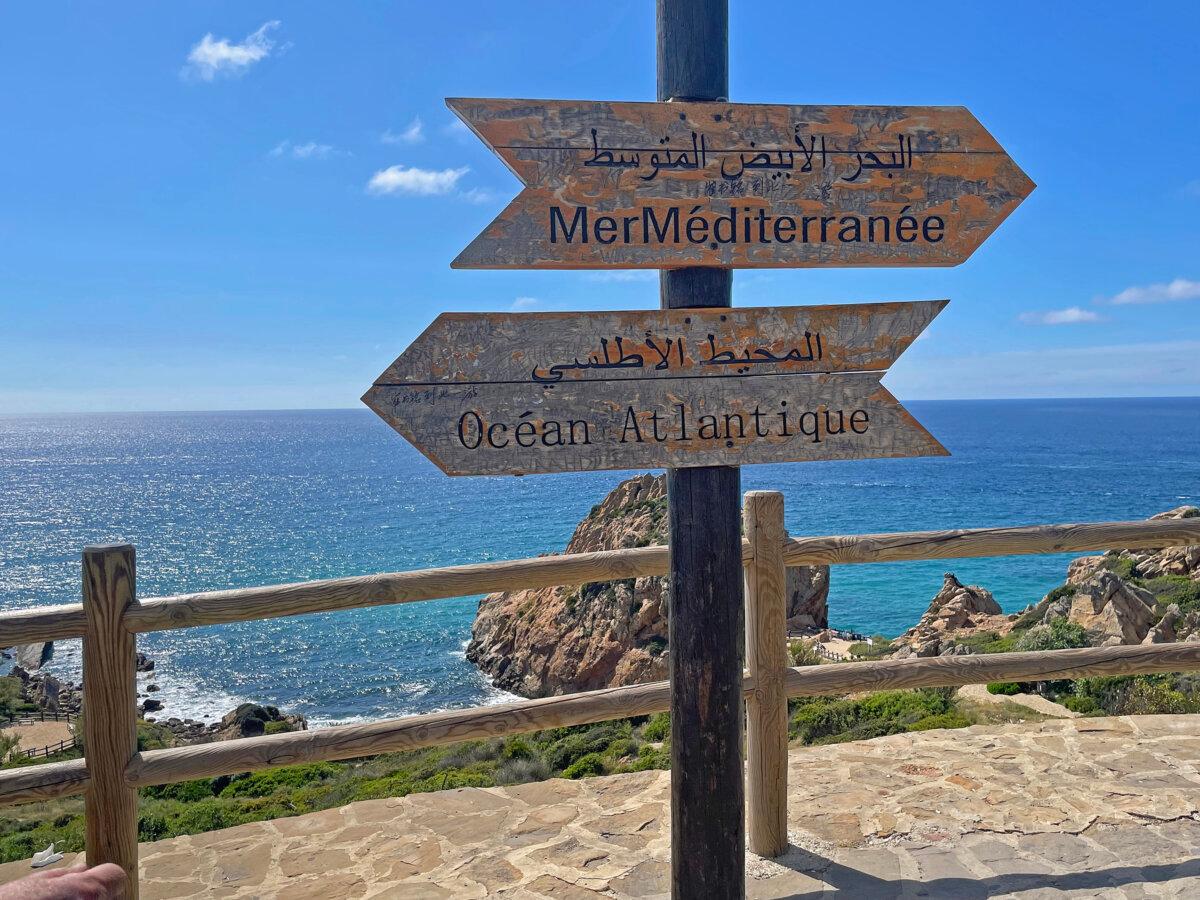 A signpost indicates where the Atlantic Ocean and Mediterranean Sea converge off the coast of Tangier, Morocco. (Norma Meyer/TNS)