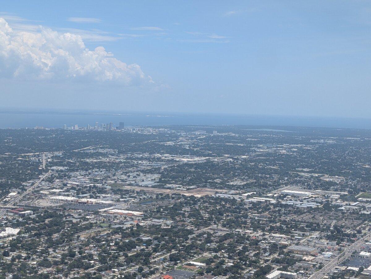 View of downtown St. Petersburg, Fla., during a ride-along with Universal Flight Training on May 29, 2025. (Jacob Burg/The Epoch Times)