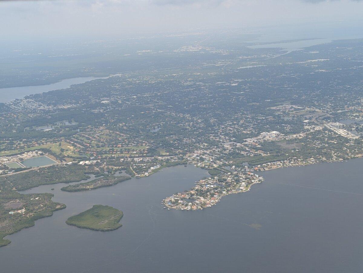 View of Garden Island (L) and Indian Bluff Island (R) in Palm Harbor, Fla., during a ride-along with Universal Flight Training on May 29, 2025. (Jacob Burg/The Epoch Times)
