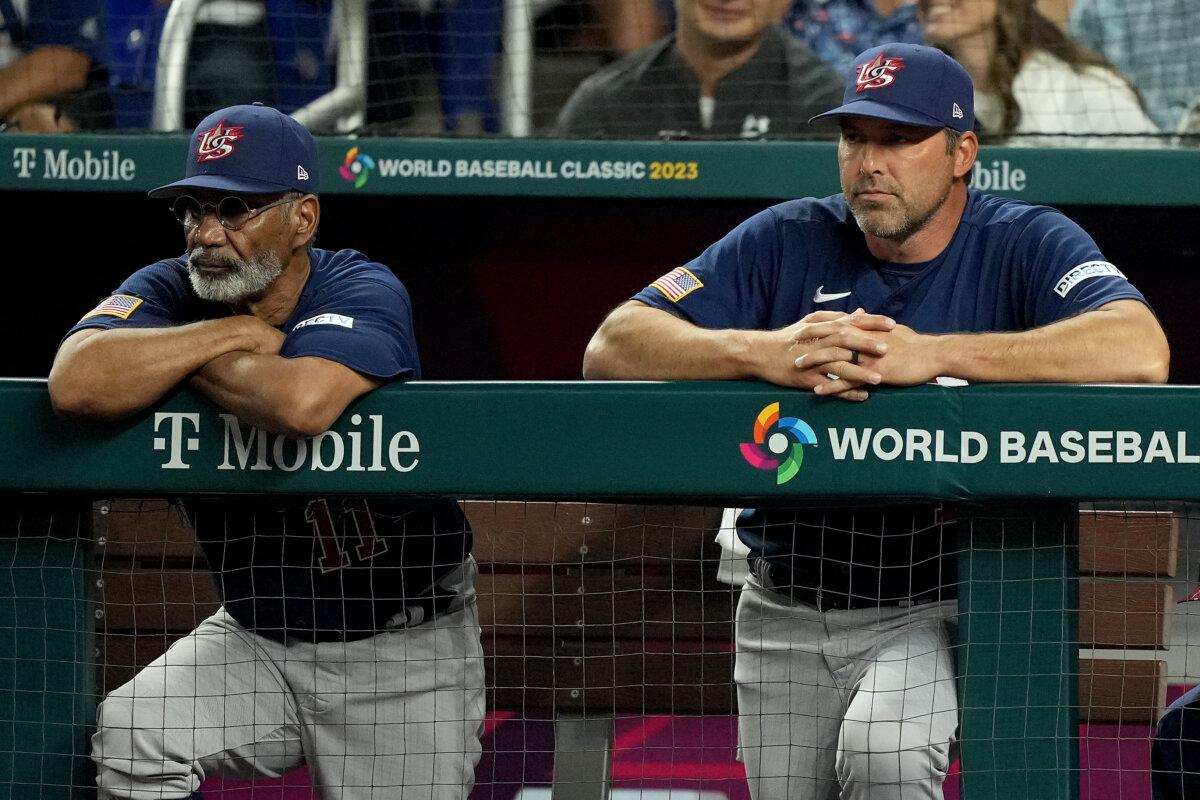Jerry Manuel and Manager Mark DeRosa look on from the dugout in the first inning against Team Japan during the World Baseball Classic Championship at loanDepot park in Miami, Fla., on March 21, 2023. (Eric Espada/Getty Images)