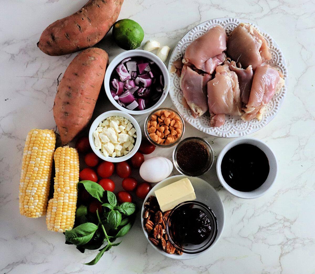 Ingredients for a budget-minded barbecue chicken dinner for four. (Gretchen McKay/Pittsburgh Post-Gazette/TNS)