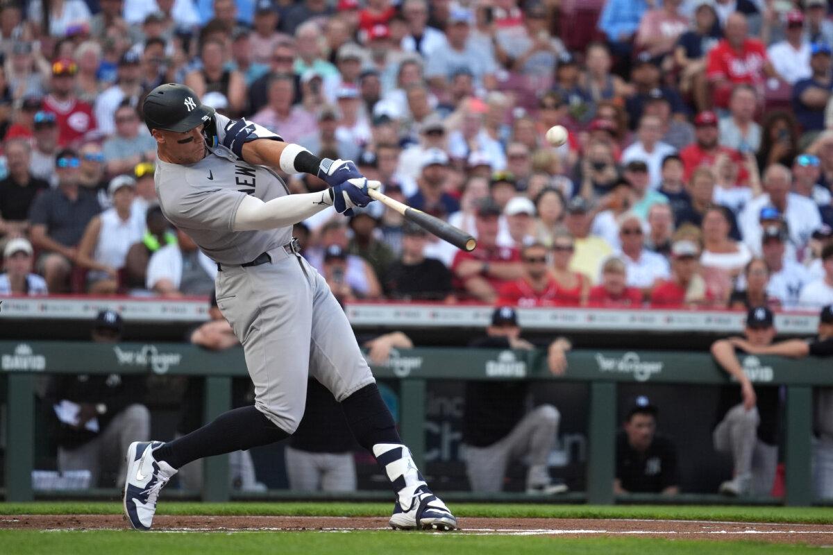 Cal Raleigh’s Historic Season Keeps Mariners in Postseason Hunt 2 Aaron Judge #99 of the New York Yankees hits a solo home run during the first inning against the Cincinnati Reds at Great American Ball Park in Cincinnati, Ohio on June 23, 2025. (Jason Mowry/Getty Images)