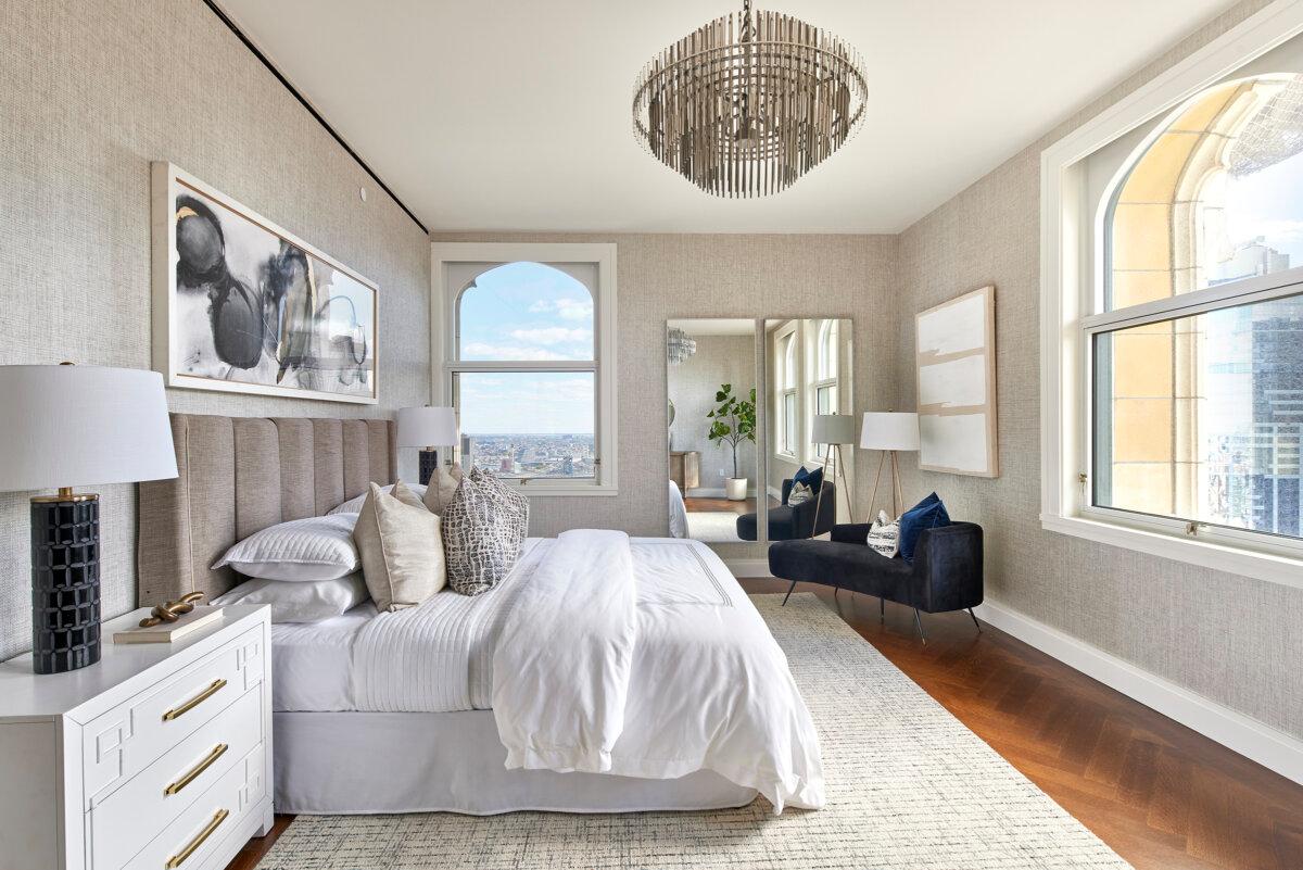 Crisp white bedding helps to create a hospitality feel. (Handout/TNS)