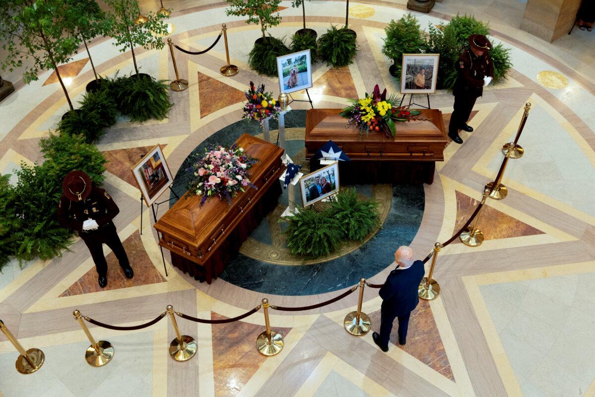 Former President Joe Biden pays his respects to senior Democratic state assembly woman Melissa Hortman and her husband Mark lie in State at the Minnesota Capitol after they were killed in a shooting, in St. Paul, Minn., on June 27, 2025. (Tim Evans/Reuters)
