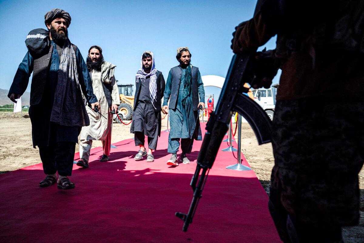 Taliban security personnel arrive to attend the inauguration of a Chinese-linked copper deposit mining project in Shast Bandari, Afghanistan, on July 24, 2024. (Wakil Kohsar/AFP via Getty Images)