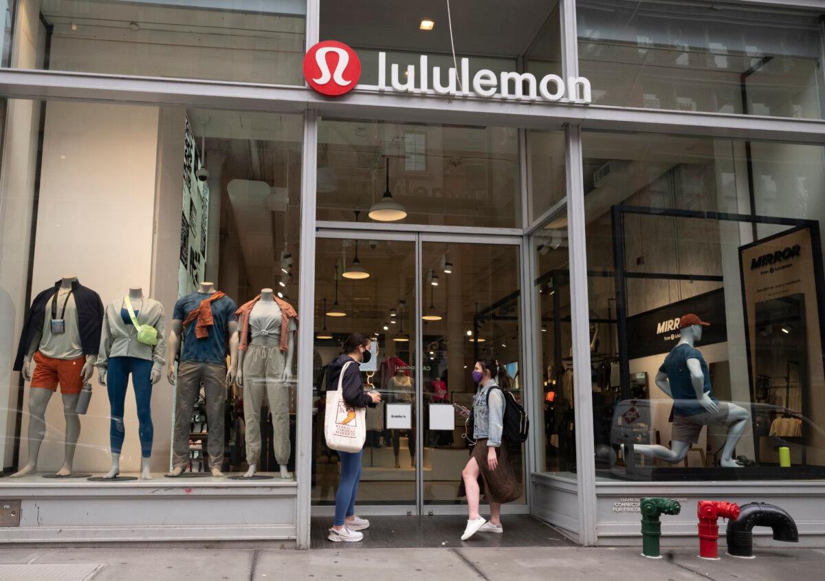 Lululemon fashions are displayed in the company store windows in New York on March 25, 2021. (Mark Lennihan/AP)