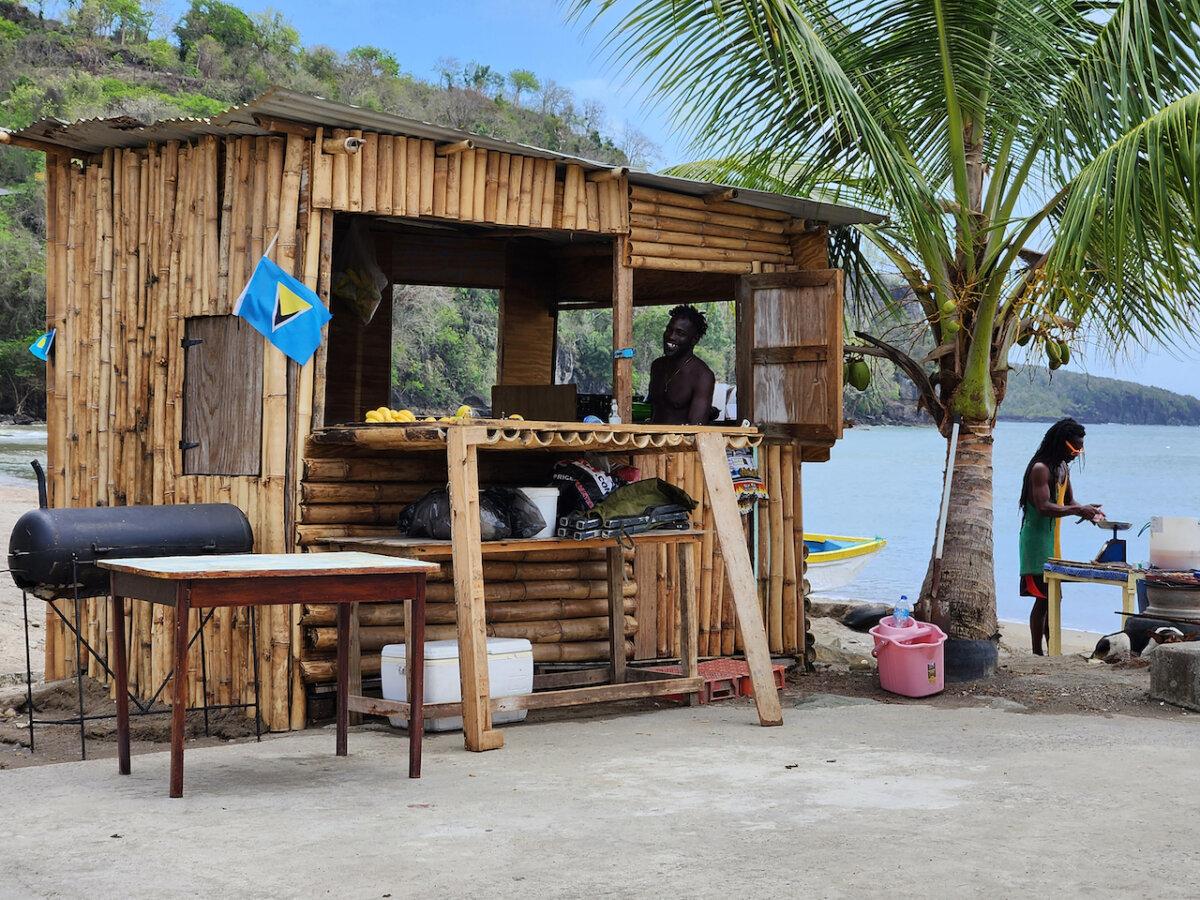 A roadside food stand in St. Lucia provides a number of local treats. (Myscha Theriault/TNS)