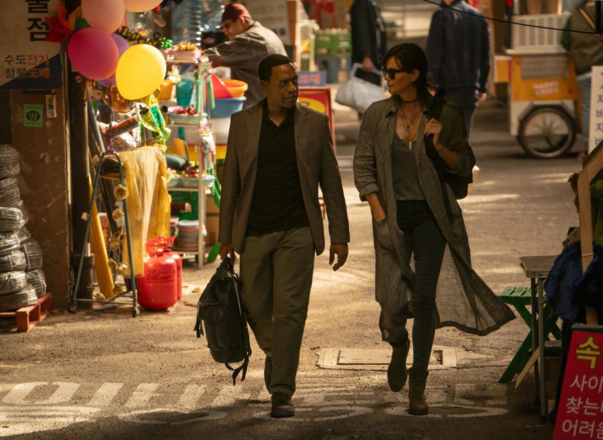 James Copley (Chiwetel Ejiofor) and Andy (Charlize Theron), in “The Old Guard 2.” (Eli Joshua Ade/Netflix)