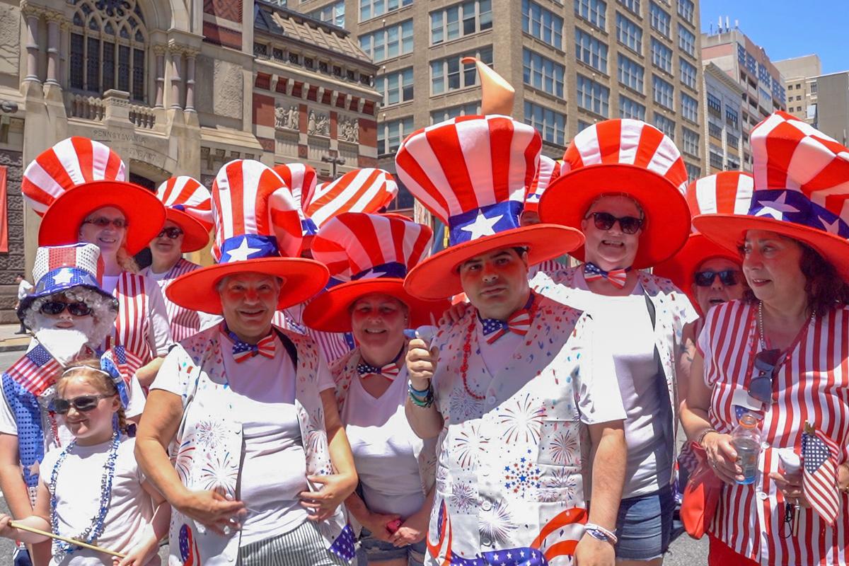 Regina Romani (2nd from left, front), an organizer with the Flying Dutchman Comic Brigade, attends Philadelphia’s Independence Day parade, on July 4, 2025. (Steve Wen/The Epoch Times)