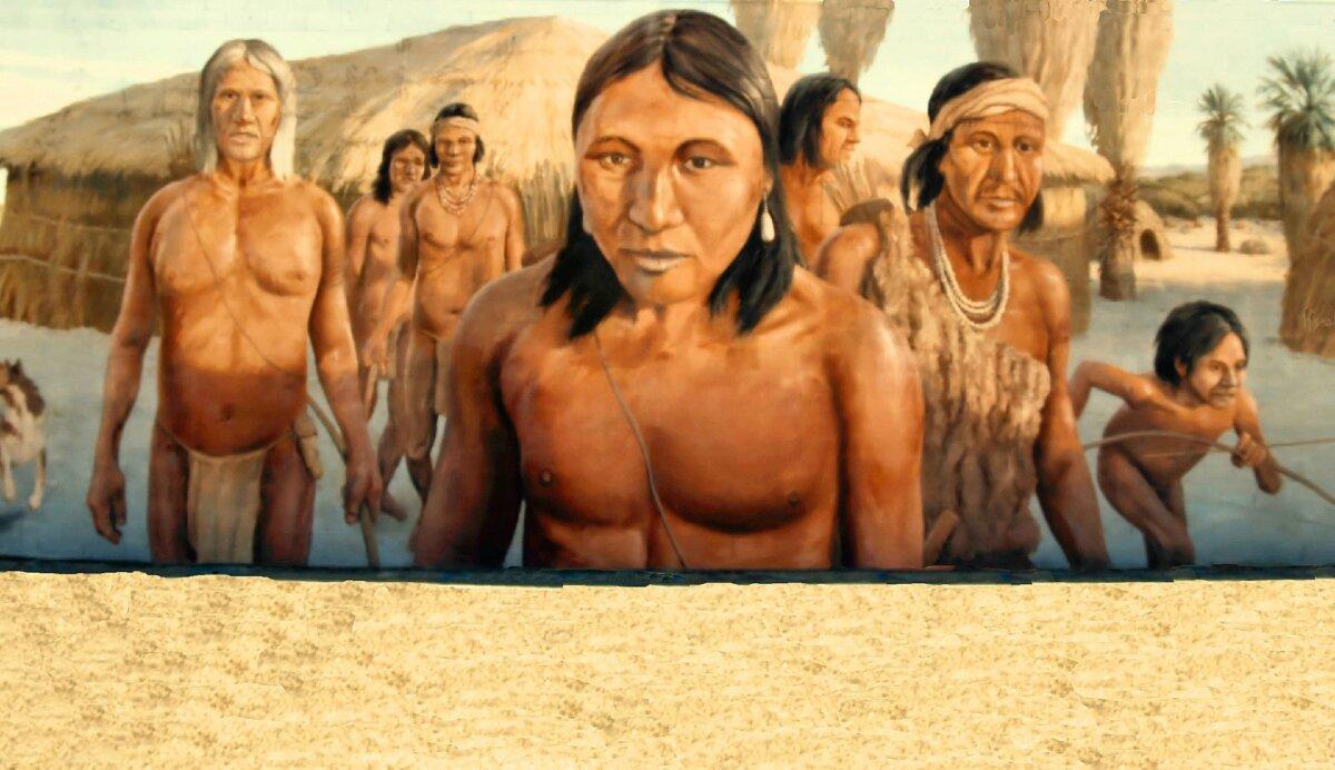 A mural by Don Gray that depicts the history of local Native Americans welcomes travelers to the desert near Palm Springs, California. (Randomshots/Dreamstime)
