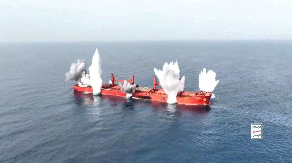 Plumes of smoke rise from what is said to be a Liberia-flagged, Greek-operated bulk carrier, the MV Magic Seas, that was, according to Yemen's Houthis, attacked following an alleged exchange with the captain, off southwest Yemen, in this screen grab taken from a handout video released on July 8, 2025. (Houthi Media Center/Handout via Reuters)