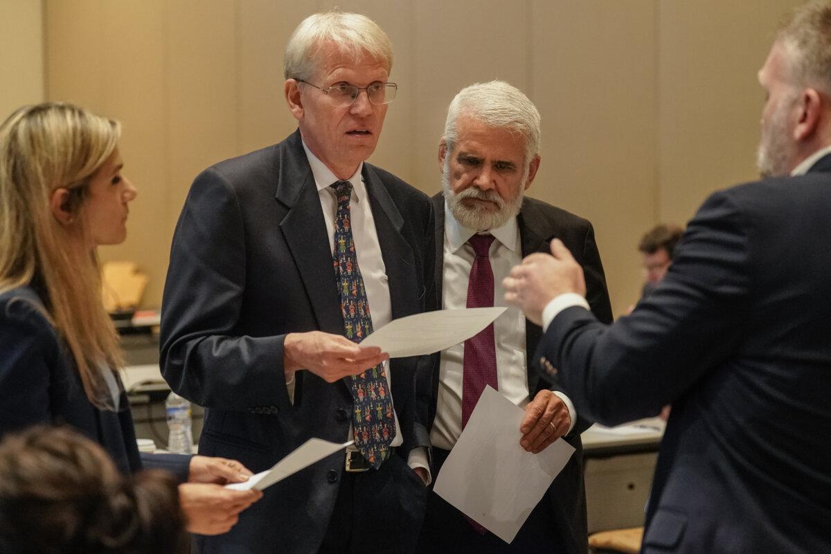 Martin Kulldorff (C) and Dr. Robert Malone on break during a meeting of the Advisory Committee on Immunization Practices in Atlanta on June 25, 2025. (Elijah Nouvelage/Getty Images)
