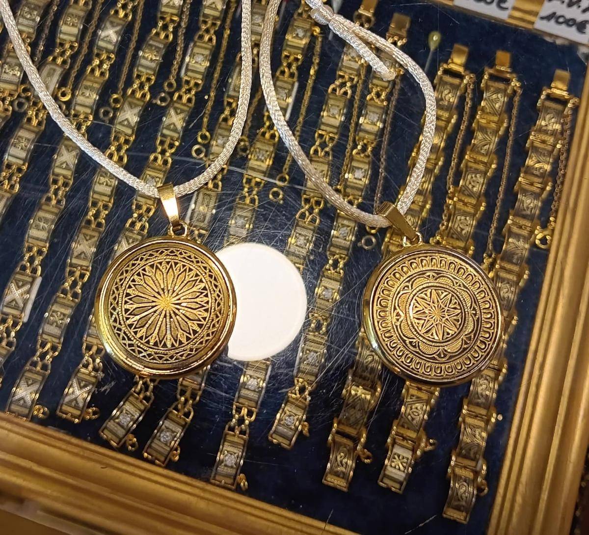 Damascene jewelry is blackened steel inlaid with intricate gold or silver patterns. It's a traditional Toledo craft that was first introduced to Spain by the Moors. (Autumn Spredermann)