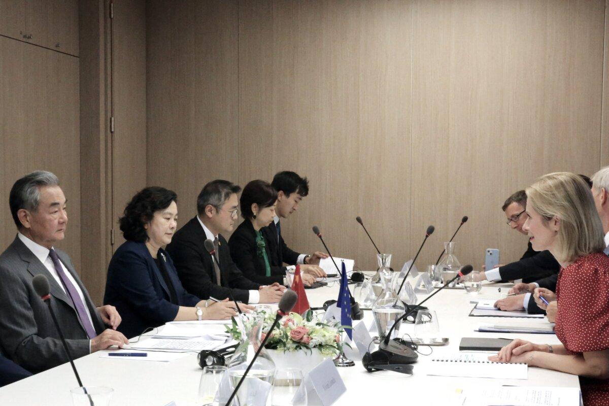 EU High Representative and Vice-President for Foreign Affairs and Security Policy Kaja Kallas (R) and Chinese Foreign Minister Wang Yi (L) attend a meeting as part of the 13th EU-China Strategic Dialogue, in Brussels on July 2, 2025. (François Walschaerts/AFP via Getty Images)