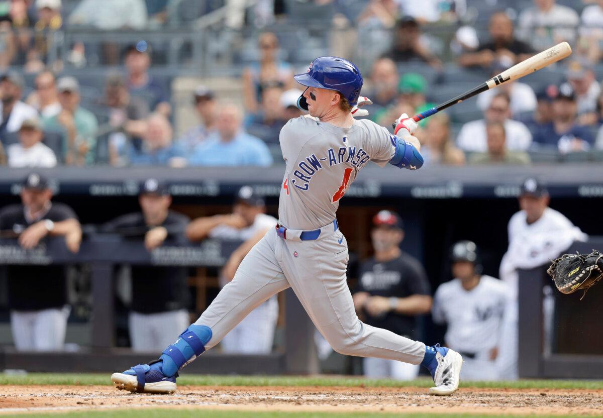 Pete Crow-Armstrong of the Chicago Cubs follows through on his seventh-inning RBI infield single against the Yankees in New York on July 13, 2025. (Jim McIsaac/Getty Images)