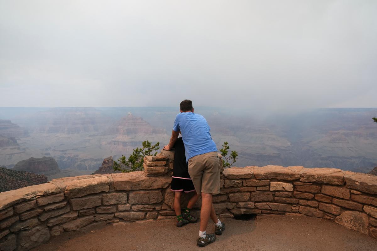 Smoke from the Dragon Bravo fire moves over the Grand Canyon from the North Rim in Grand Canyon National Park, Ariz., on July 14, 2025. (Ross D. Franklin/AP Photo)