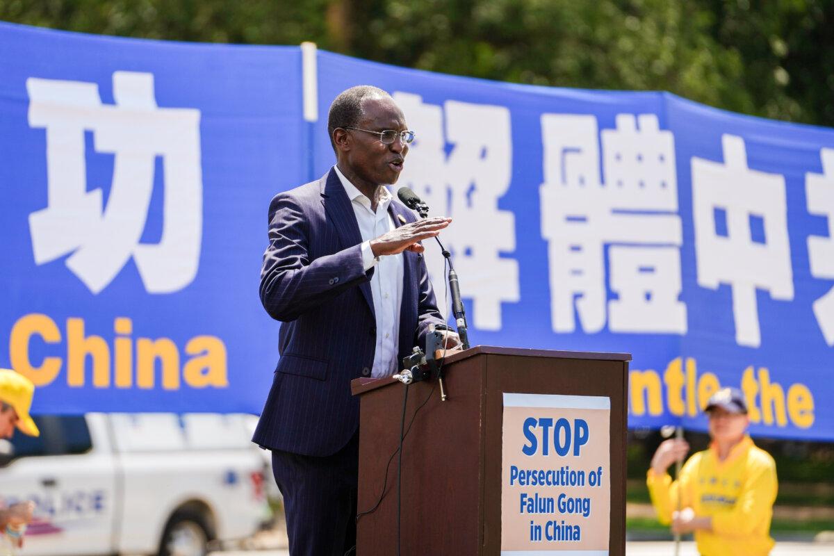 Mohamed Elsanousi, commissioner of the U.S. Commission on International Religious Freedom (USCIRF), speaks during a rally calling for the end of the Chinese Communist Party’s 26 years of persecution of Falun Gong in China, on the National Mall in Washington on July 17, 2025. (Madalina Kilroy/The Epoch Times)