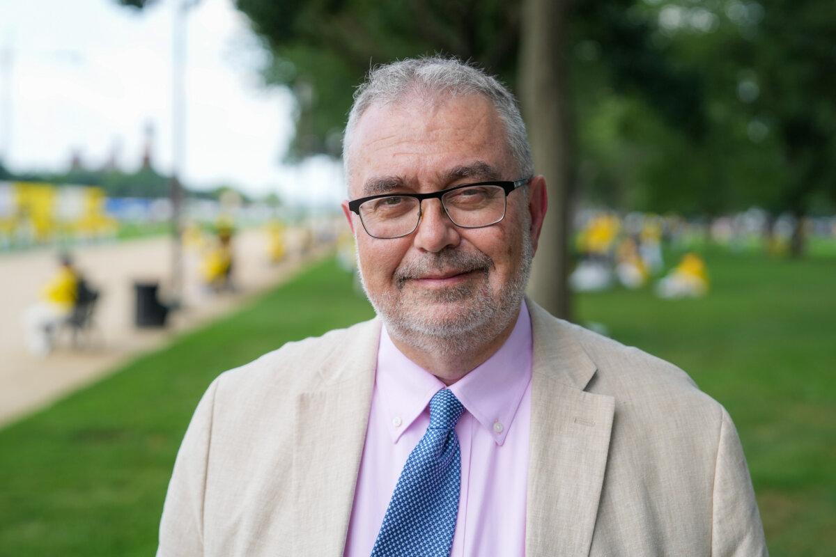 Piero Tozzi, staff director of the Congressional-Executive Commission on China, attends an annual rally calling for the end of the Chinese Communist Party’s ongoing persecution of Falun Gong in China, on the National Mall in Washington on July 17, 2025. (Samira Bouaou/The Epoch Times)