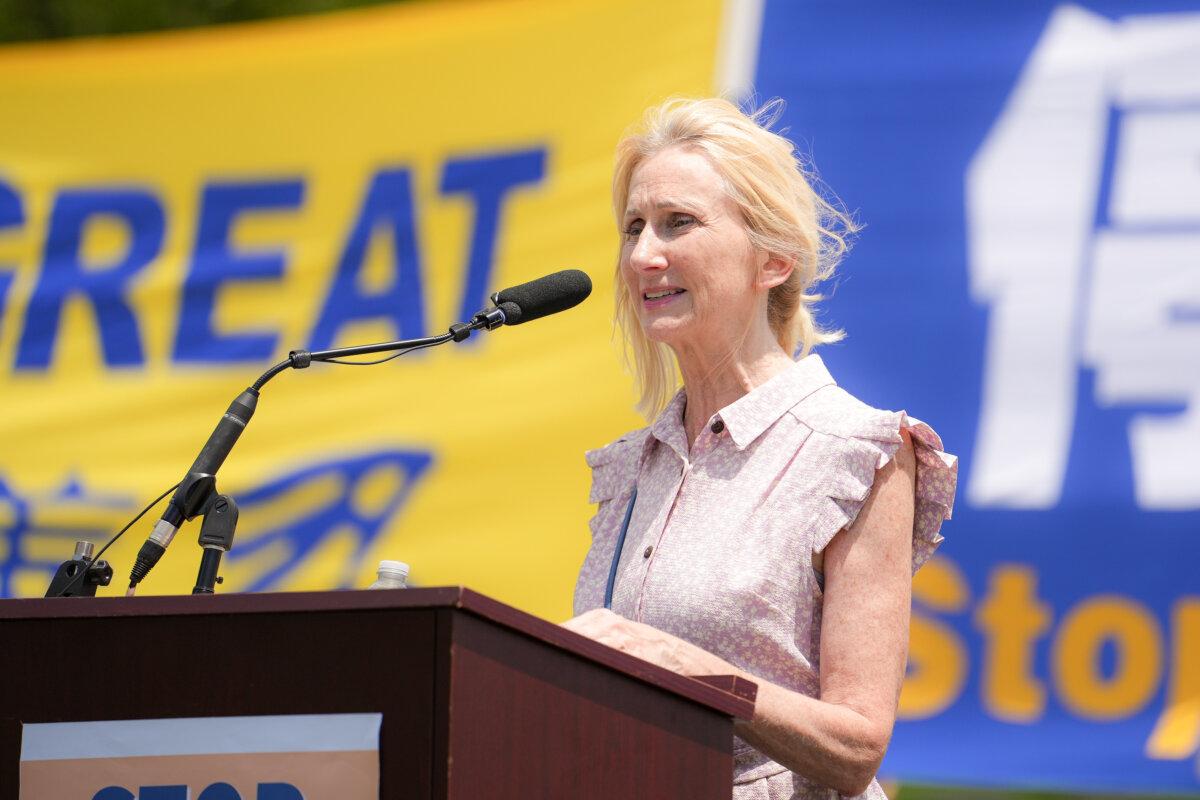 Wendy Wright, president of the Christian Freedom International, speaks during a rally calling for the end of the Chinese Communist Party’s 26 years of persecution of Falun Gong in China, on the National Mall in Washington on July 17, 2025. (Madalina Kilroy/The Epoch Times)