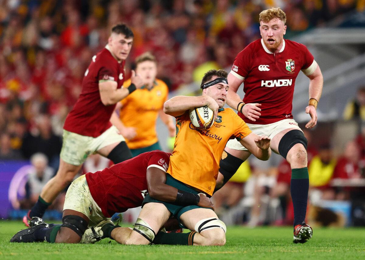 British and Irish Lions Defeat Wallabies in First Test Match | USNN World News Nick Frost of the Wallabies is tackled during game one of the series between the Australian Wallabies and the British & Irish Lions at Suncorp Stadium in Brisbane, Australia on July 19, 2025. (Chris Hyde/Getty Images)