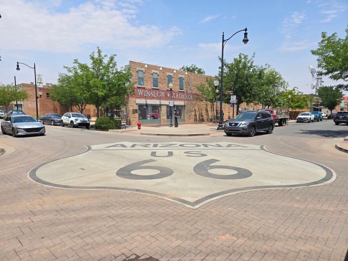 The Arizona US 66 shield marks the intersection along Historic 66 in Winslow, Ariz., on July 16, 2025. (Allan Stein/The Epoch Times)