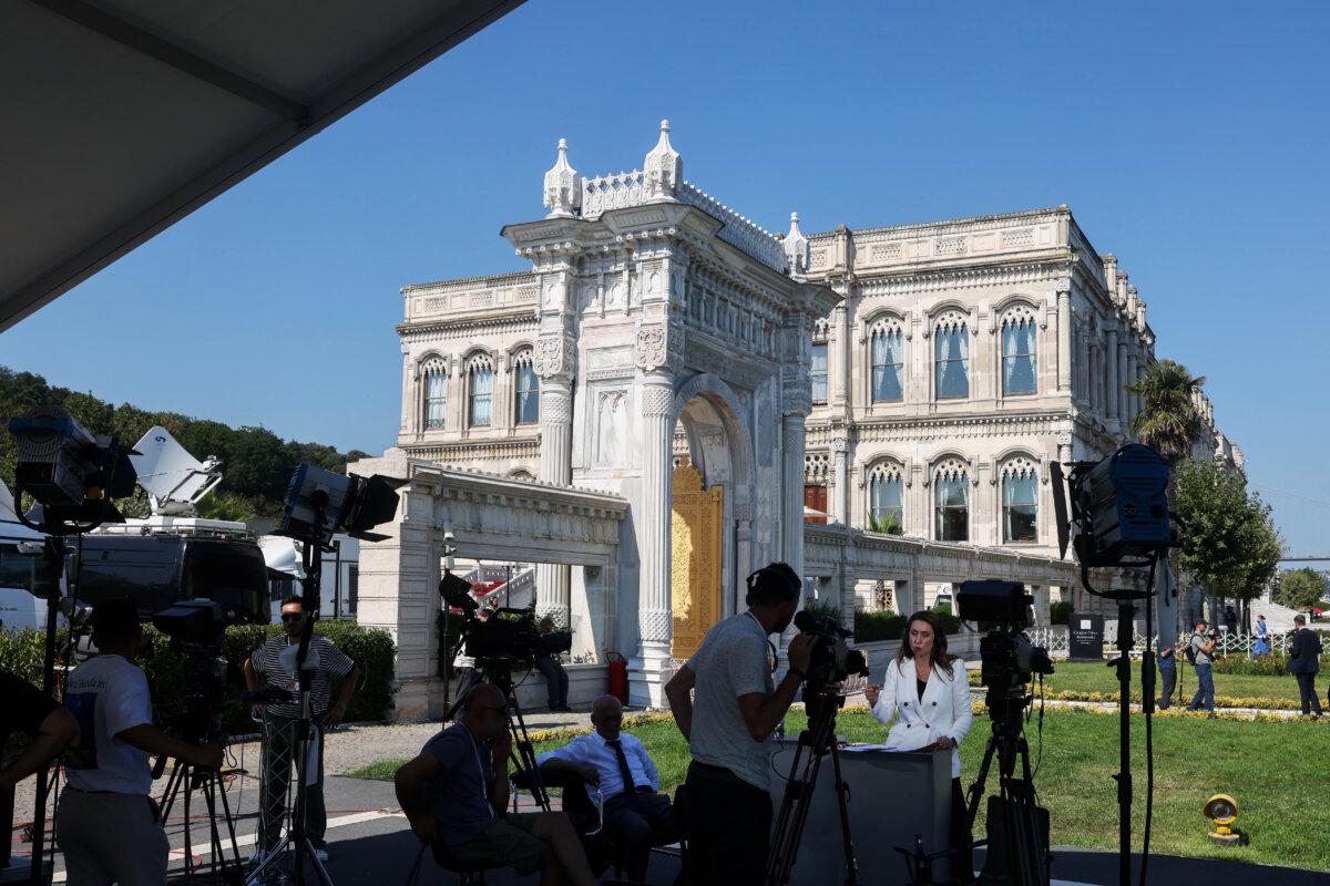 Media personnel at work ahead of a third round of Russia–Ukraine cease-fire talks at the Ciragan Palace in Istanbul on July 23, 2025. (Chris McGrath/Getty Images)