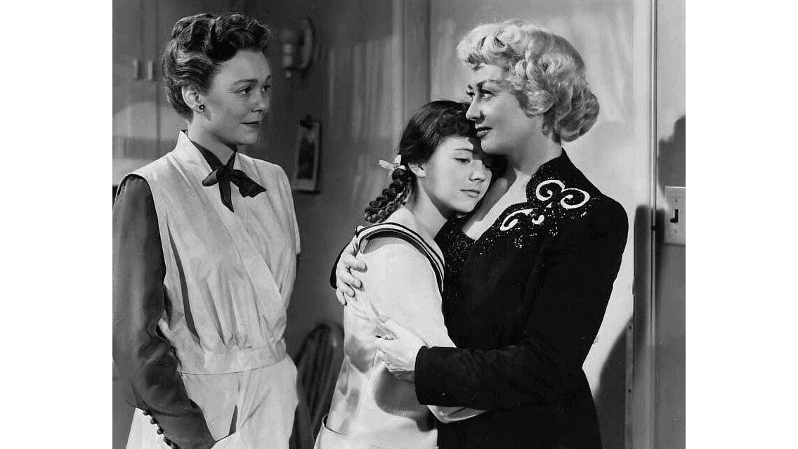 (L–R) Louise Mason (Jane Wyman), Stephanie Rawlins (Natalie Wood), and Annie Rawlins (Joan Blondell), in “The Blue Veil.” (RKO Radio Pictures)