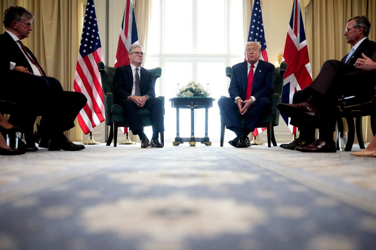 British Prime Minister Keir Starmer speaks with U.S. President Donald Trump during a bilateral meeting in Turnberry, Scotland, on July 28, 2025. (Christopher Furlong/Pool/AFP via Getty Images)