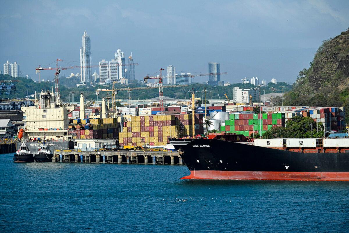 What Trump’s National Security Strategy Means for Canada | USNN World News A cargo ship waits at Balboa Port before crossing the Panama Canal in Panama City on Feb. 4, 2025. (Martin Bernetti/AFP via Getty Images)